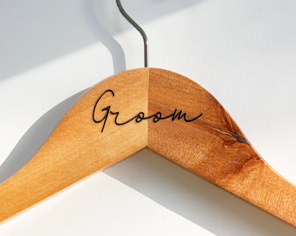 laser engraving groom on wooden hanger